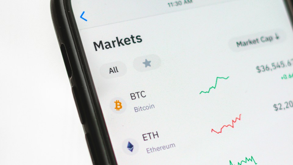 Cryptocurrency market prices on a smartphone