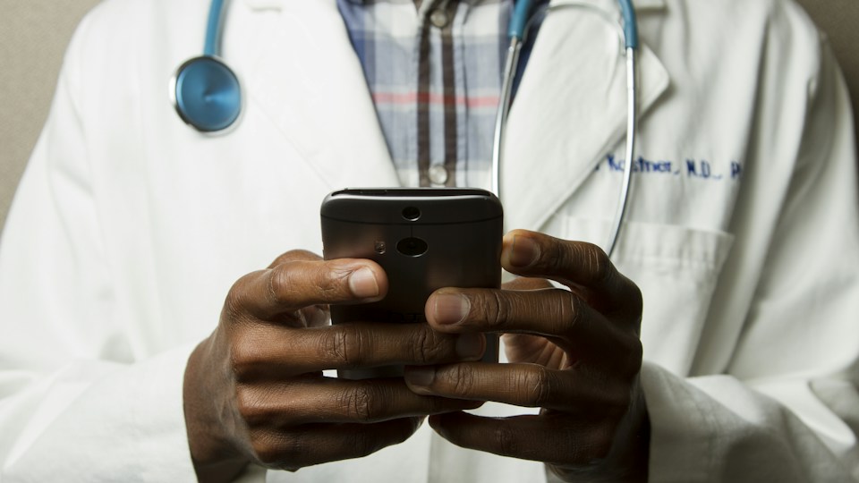 Medical professional wearing a stethoscope